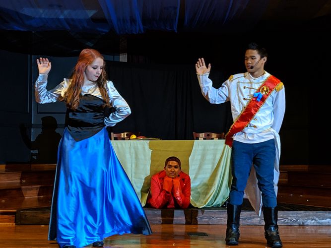 TheLittleMermaidJr-ArielandPrinceEricdancewhileSebastiantheCrabwatchesfromhishidingspotunderthedinnertable image TheLittleMermaidJr-ArielandPrinceEricdancewhileSebastiantheCrabwatchesfromhishidingspotunderthedinnertable Fine Arts - Haywood Christian Academy